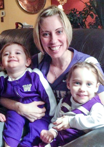 Nicole informed her parents that she was accepted into MEDEX by dressing up in Husky purple.