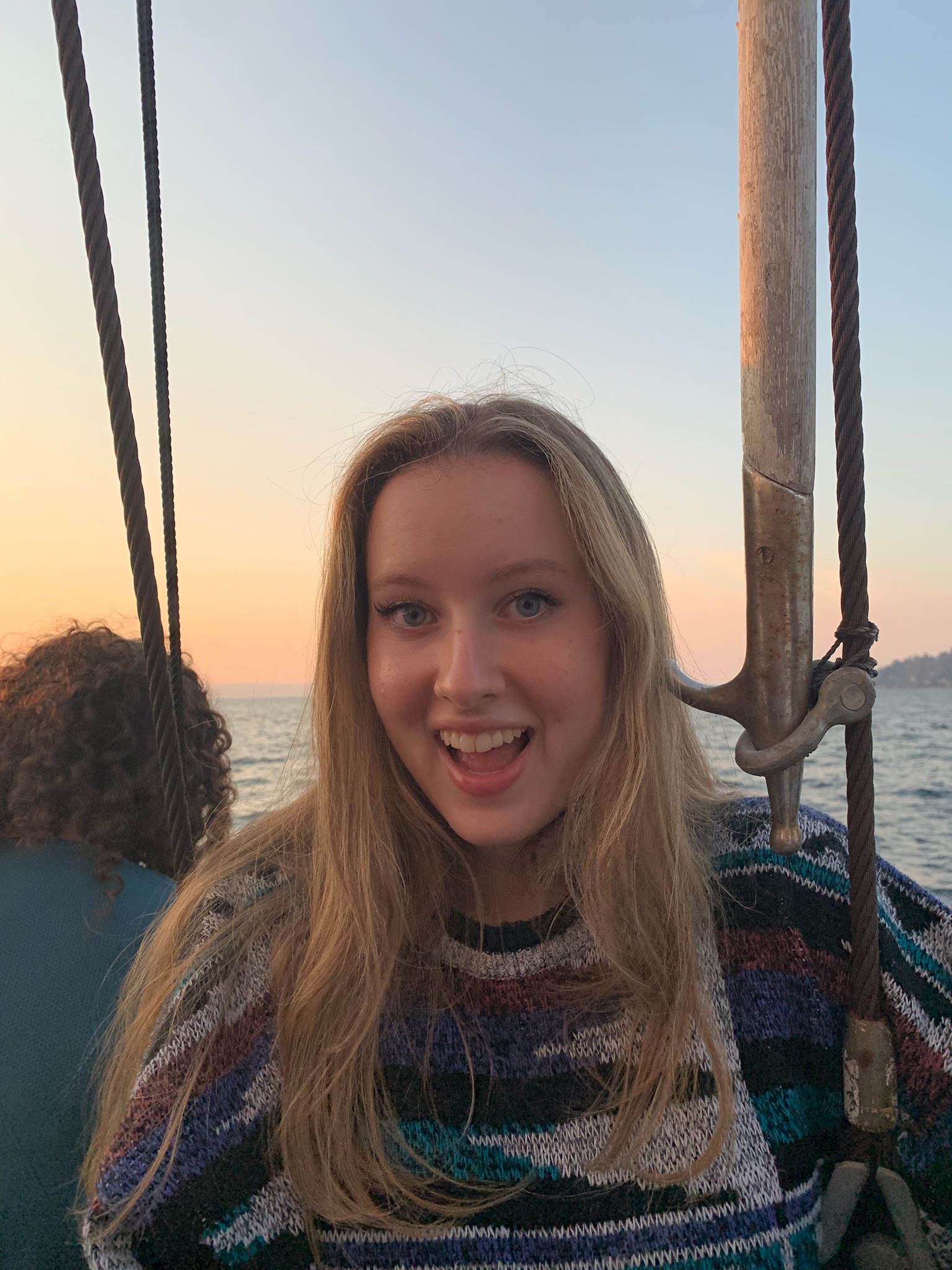 Haley on a boat with water in the background