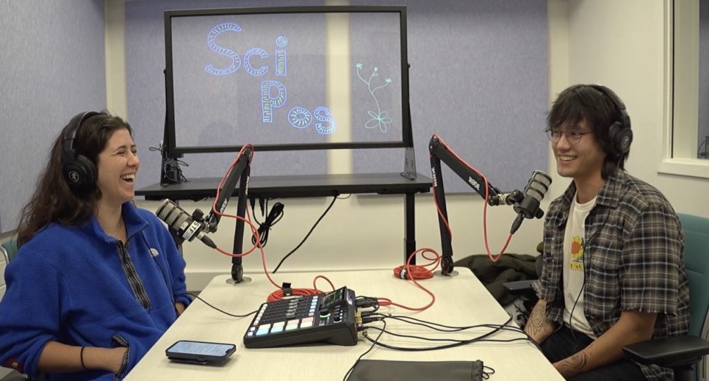 Emma and William laugh while recording the PodCast.