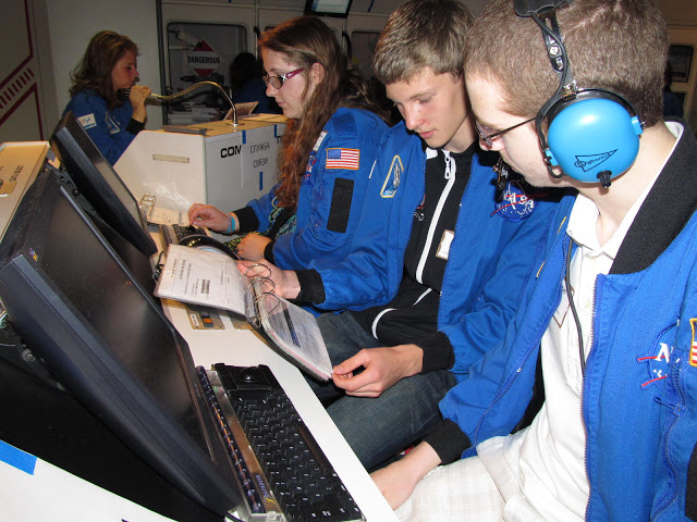 Students Wearing NASA Jackets in Training Session
