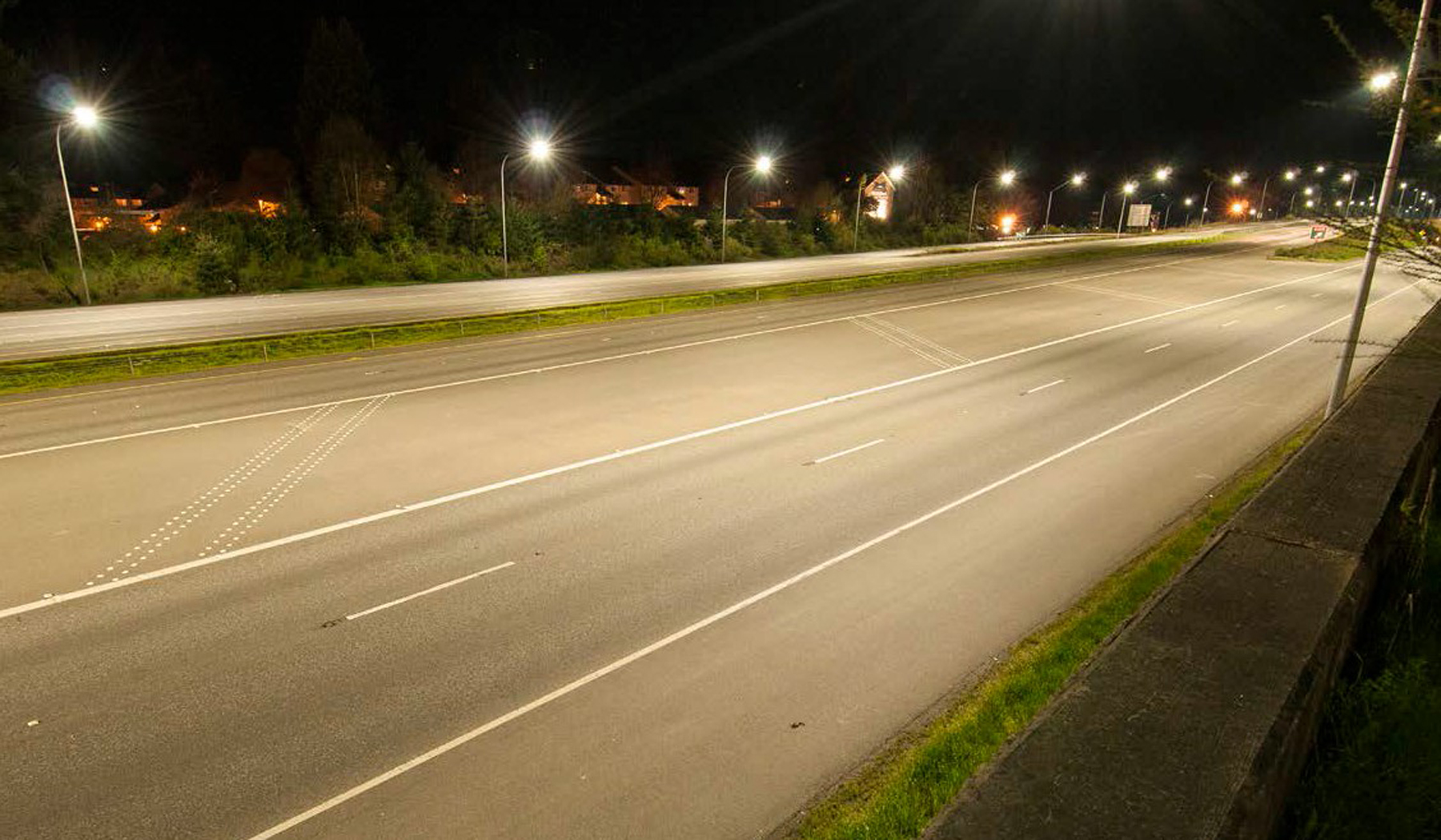 Illumination fixtures along a highway at night