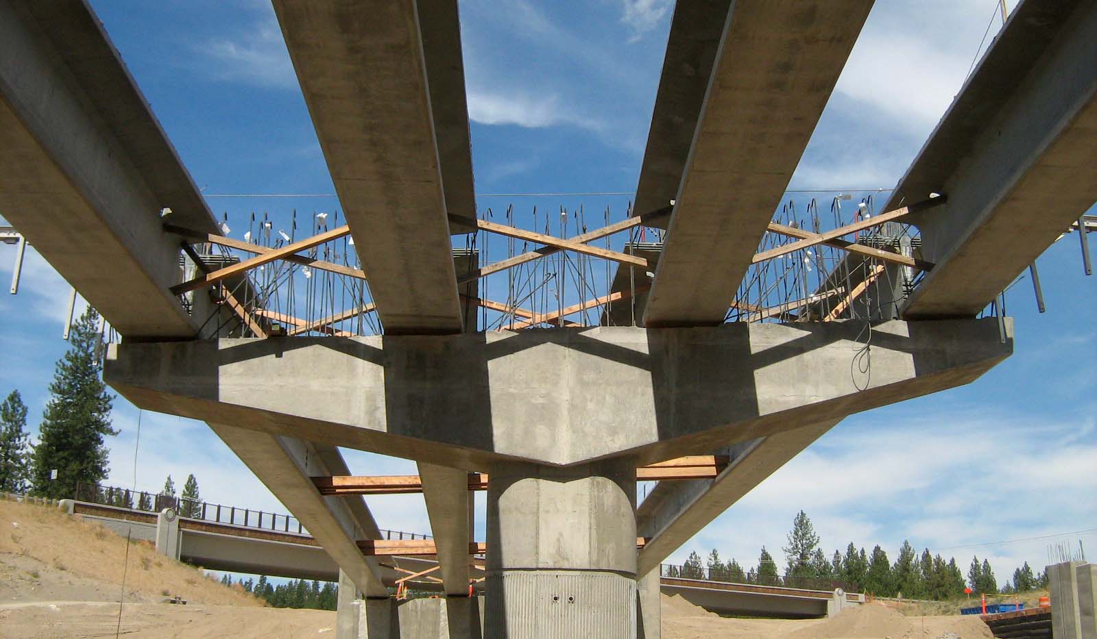 The girder structure of a bridge under construction from below