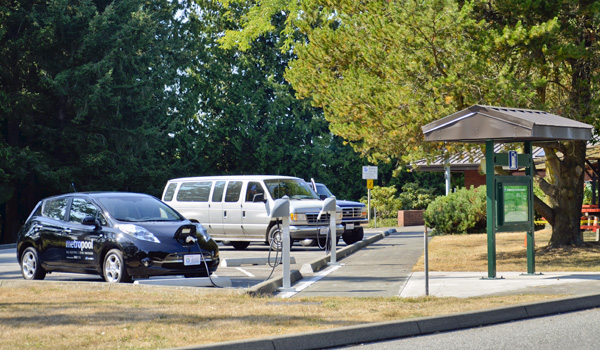 Vehicles at an electric charging station in Washington state