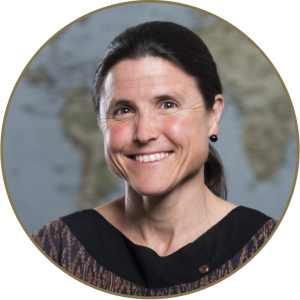 Circular headshot of Carey Farquhar, smiling, Professor and Chair, Department of Global Health