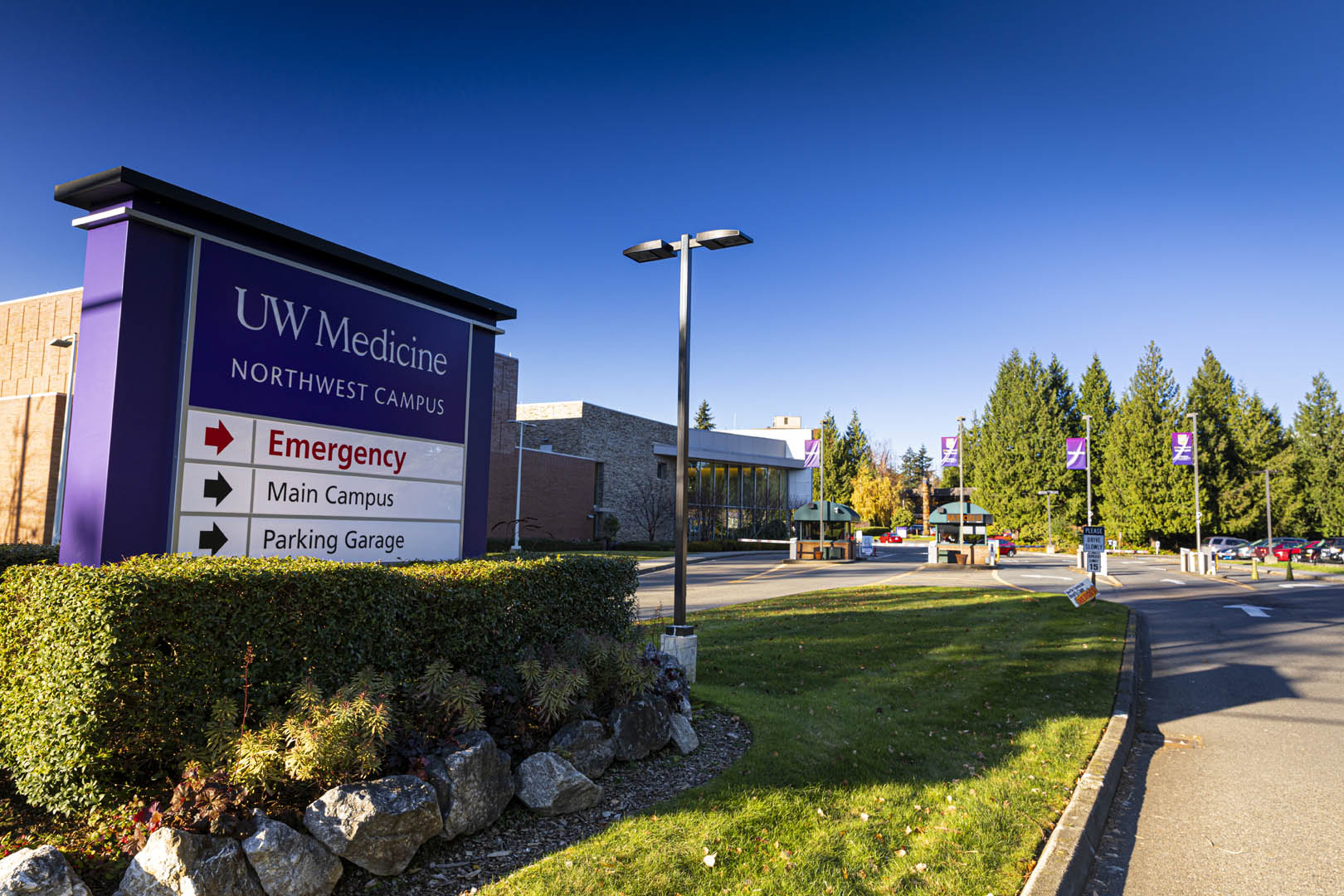 UWMC Northwest rebranded Campus entrance sign on a sunny day.