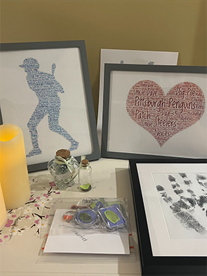 Framed keepsakes on a bedside table.