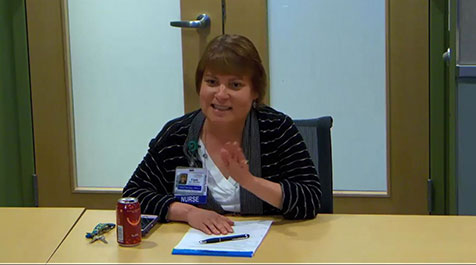 Cindy Sayre seated at desk