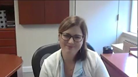 Keri Nasenbeny seated at desk