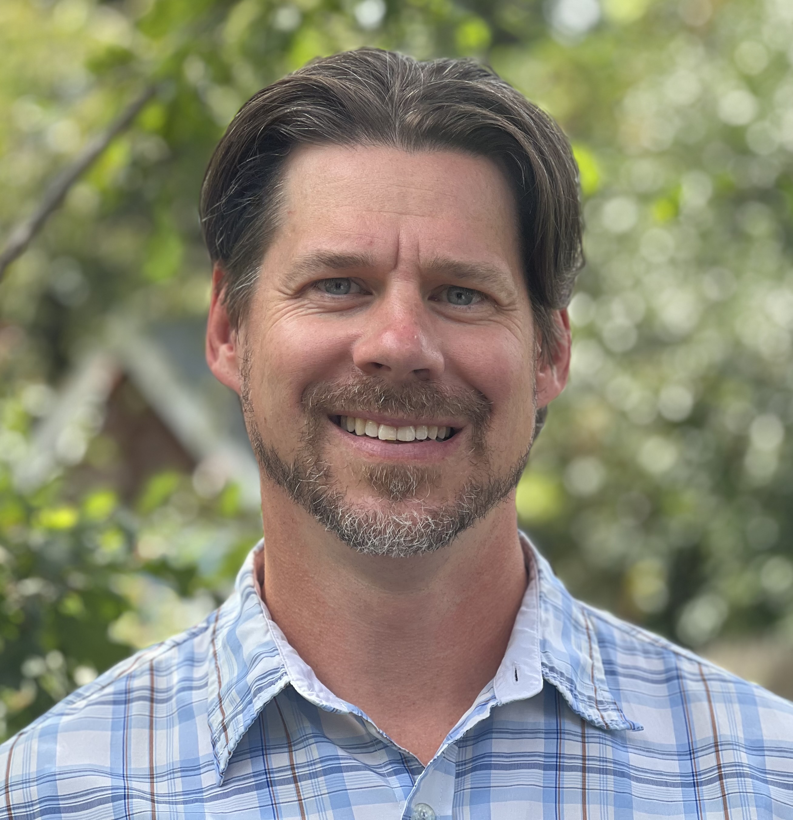 Middle-age man with dark hair and light skin